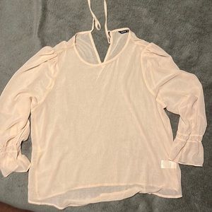 Beautiful sheer beige colored blouse